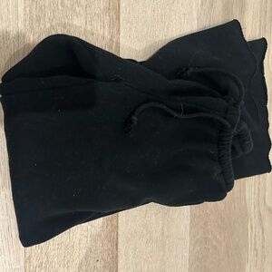 Uncuffed black sweatpants